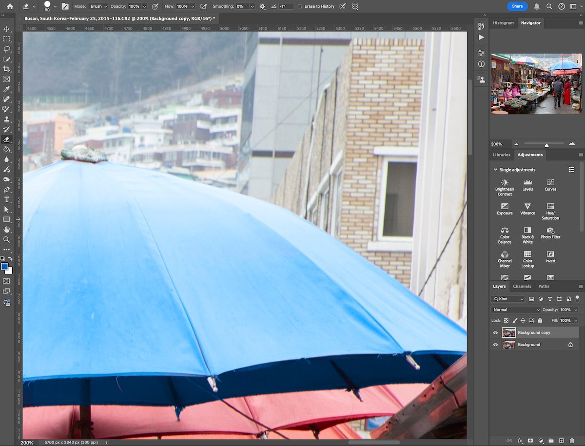 zoom in of blue umbrella in photoshop