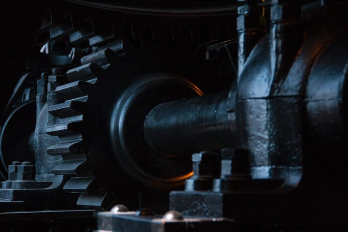 Close up shot of industrial machinery in low light