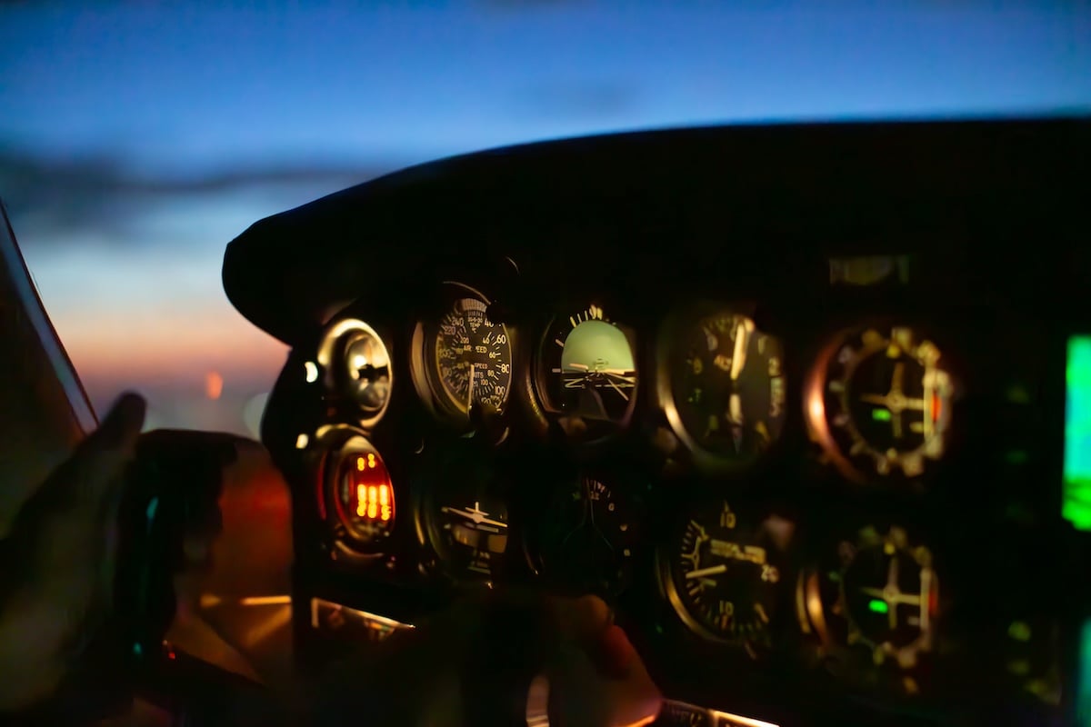 photo of a cockpit at night