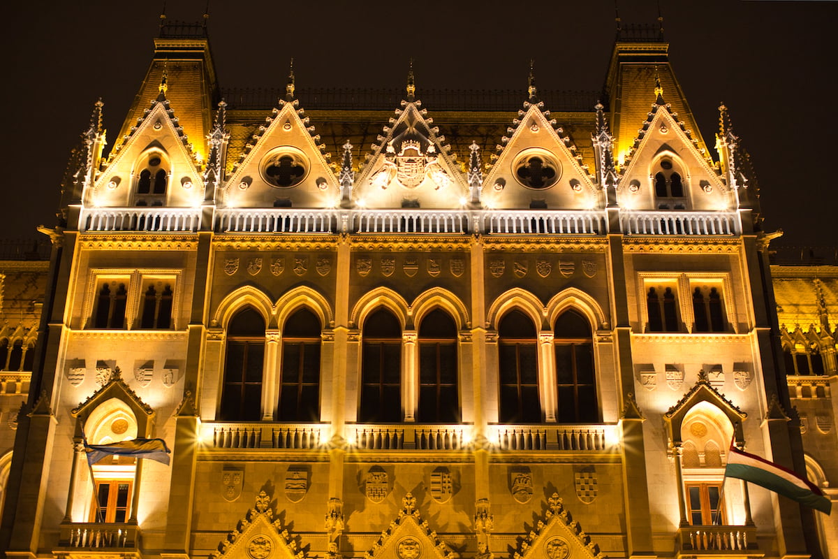 Edited image of&nbsp; building facade with lights and starburst effect at night