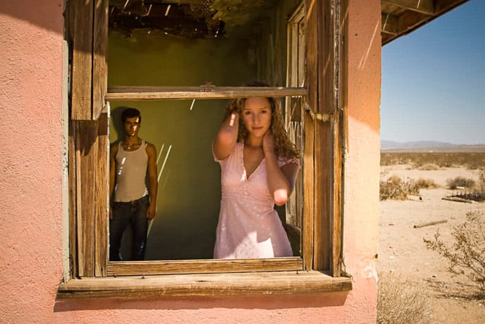 A lifestyle photo shoot with two TFP models posing by a windowsill