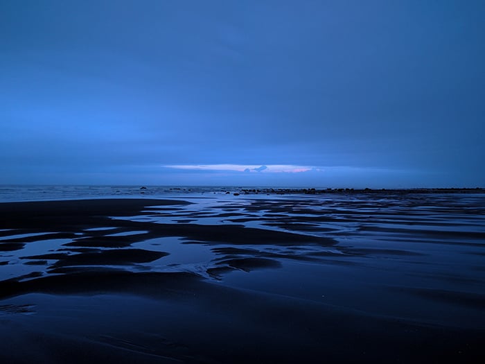 An overcast barren landscape with natural blue light for creative lighting ideas